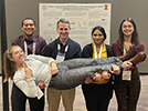 Maria triumphant at her poster at the ACS Midwest/Great Lakes Regional Meeting in St. Louis, October 2023